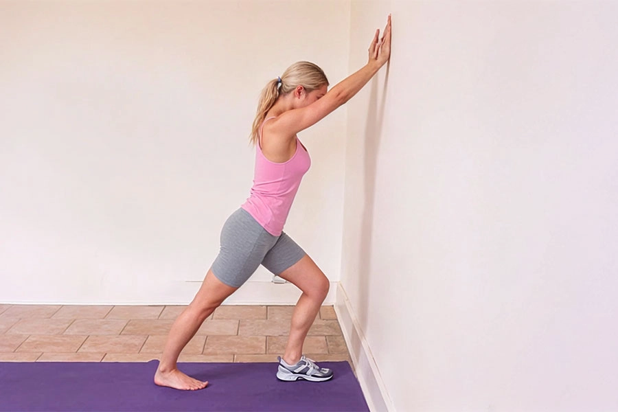 Standing Calf Stretch Against the Wall